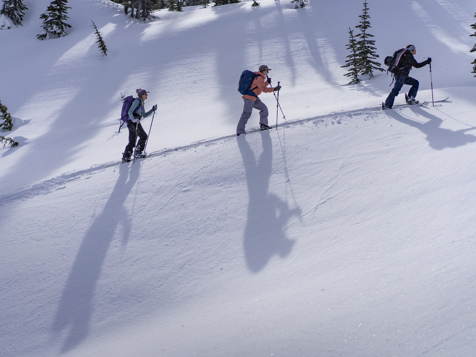 Sandy Ward leads Leah Evans and Marie-France Roy through Sandy’s traditional territory of the Líl̓wat Nation in British Columbia. Here, they glide up Ntáoz’a (Mount Chief Pascall) in Nlháxten (Duffey Lake/Cayoosh Creek Valley).