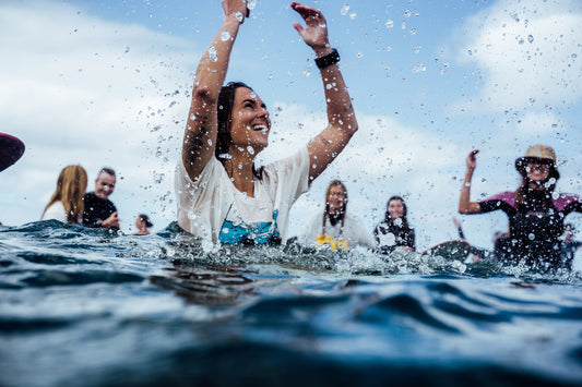 “Let’s come together and fight for sea Country. Let’s fight for the places that we love. Let’s do this.” Local shred queen and paddle out coordinator Linley Hurrell makes a splash at Saturday’s action. Photo Katey Shearer
