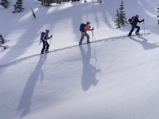 Sandy Ward leads Leah Evans and Marie-France Roy through Sandy’s traditional territory of the Líl̓wat Nation in British Columbia. Here, they glide up Ntáoz’a (Mount Chief Pascall) in Nlháxten (Duffey Lake/Cayoosh Creek Valley).