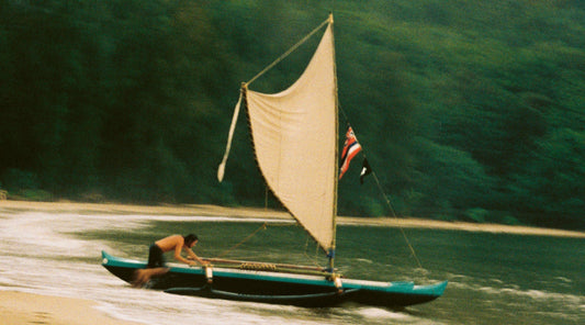 Opening image: Cromwell Day launching his family wa'a, Hekili'o Kahana. Photo Chris Miyashiro
