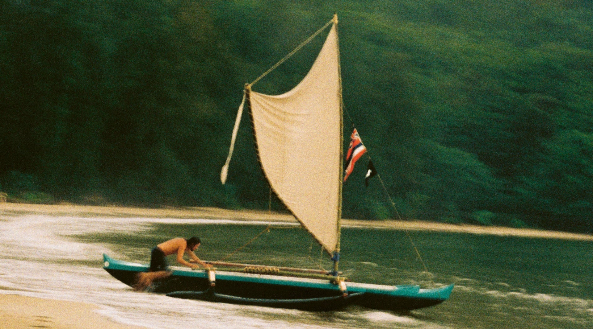 Opening image: Cromwell Day launching his family wa'a, Hekili'o Kahana. Photo Chris Miyashiro