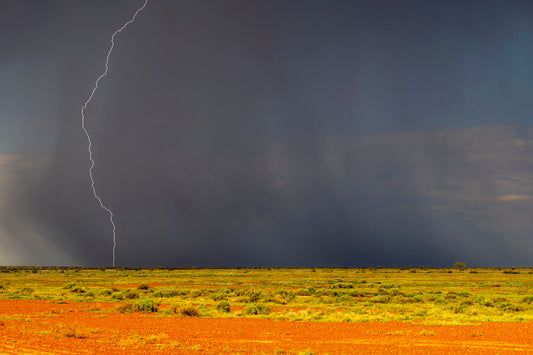 An early morning thunderstorm breaks across Antakirinja Country in South Australia. Photo Ted Grambeau