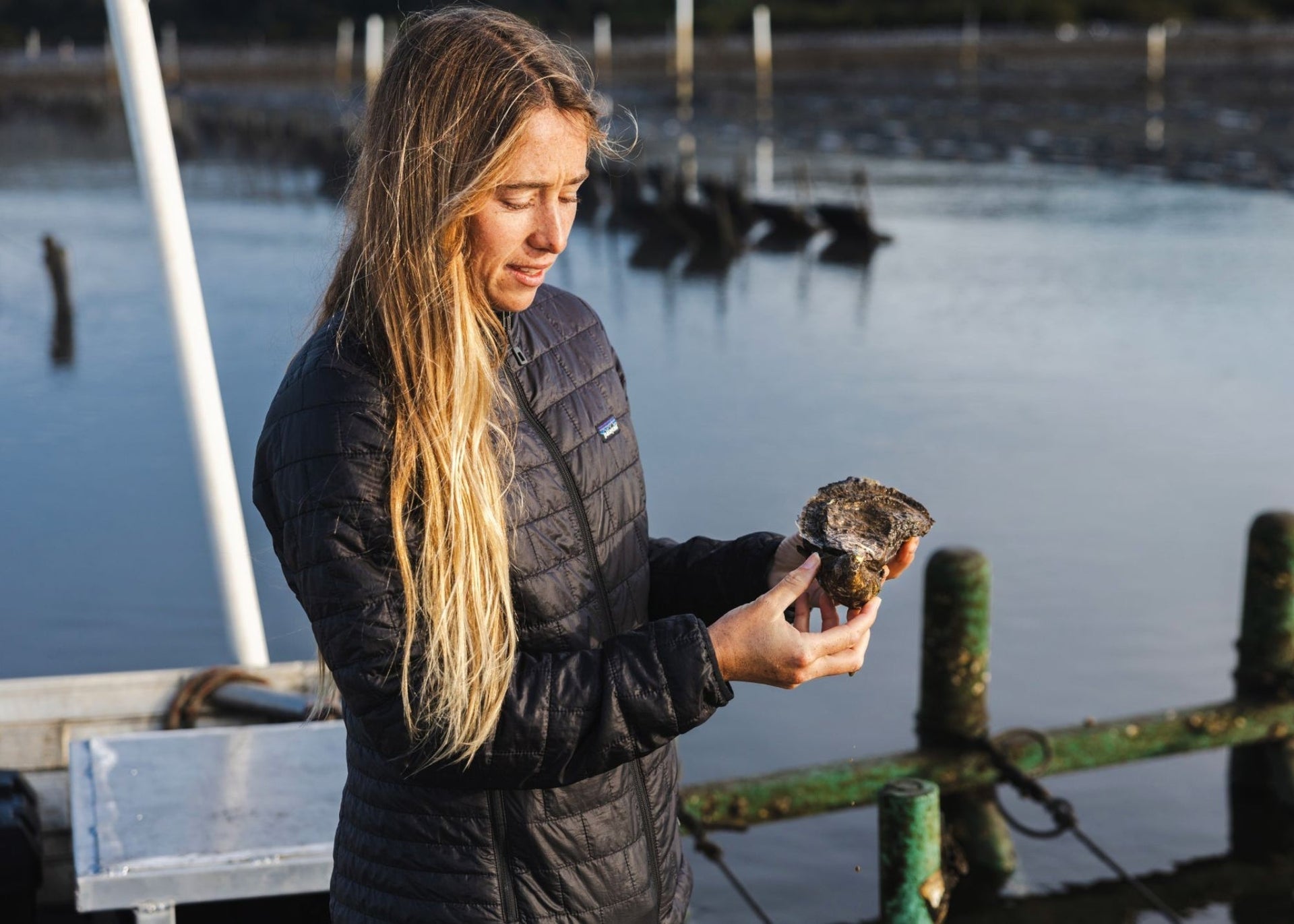 Opening image: The author, Tully White checking out a healthy Pacific oyster, fresh out of the Bhundoo River. Photo Matt Dunbar